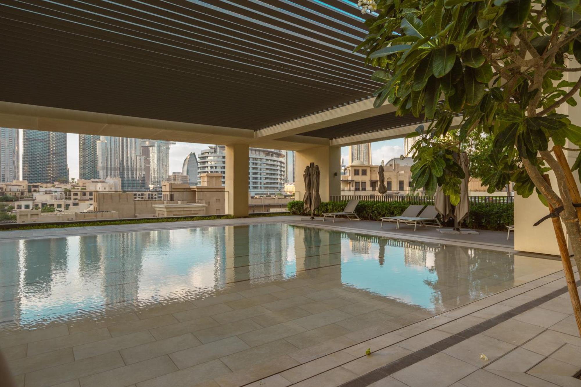 Prime Retreats @ Burj Royale By Emaar Апартаменти Дубай